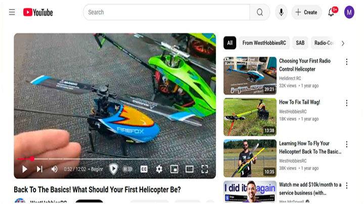 - Fingers pointing at two model helicopters (YouTube screen grab under fair use)