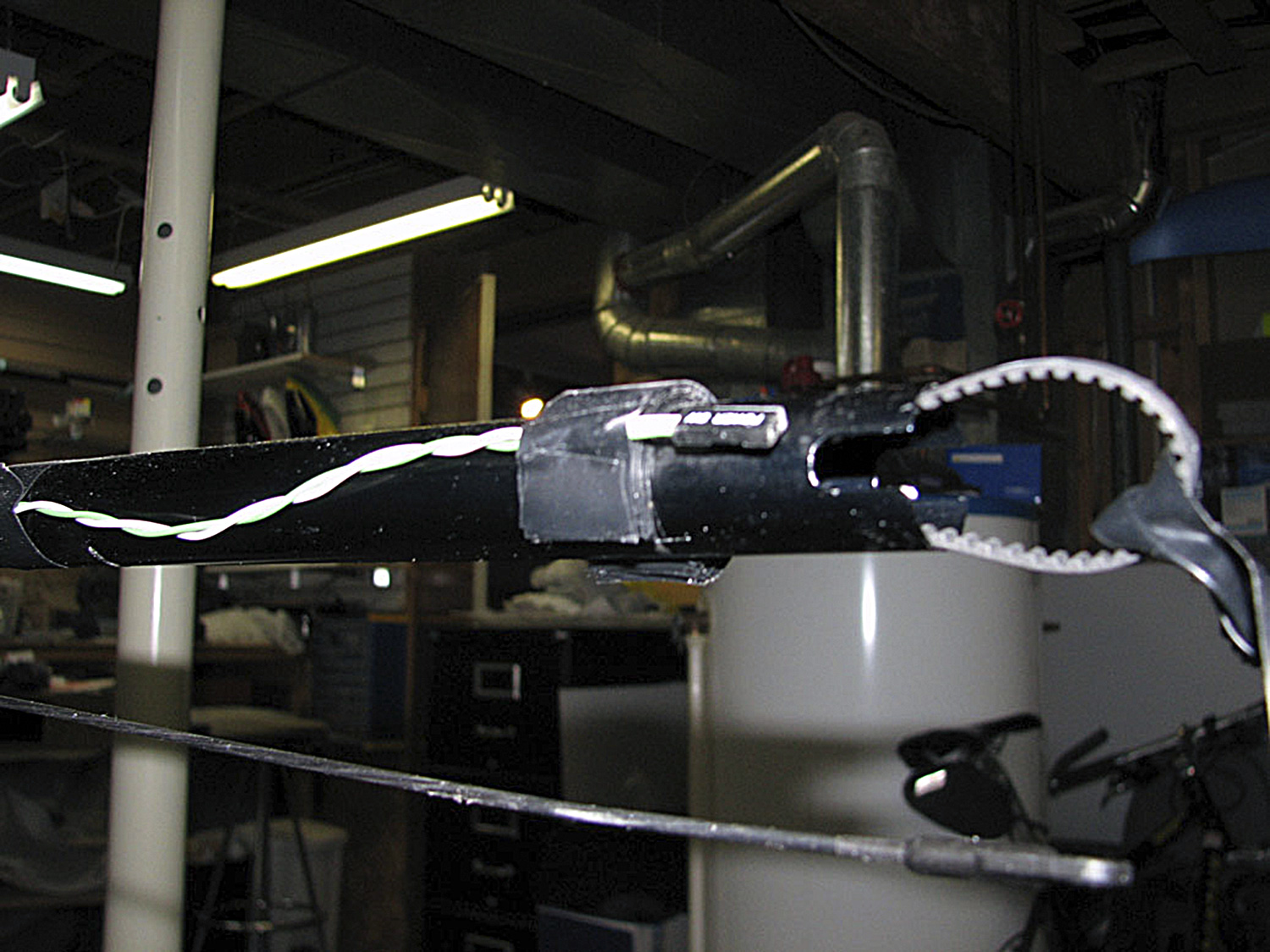 Photo of the wiring harness on the tail boom of a Pantera P6 in anticipation of being assembled into a fiberglass Funkey Hughes 500 fuselage