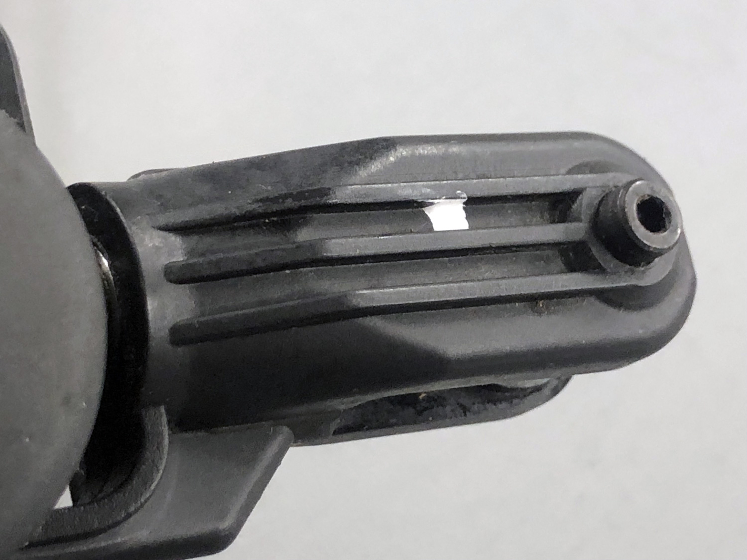 Close up of a Pantera P6 main rotor blade grip with a dab of WiteOut serving to mark the master blade