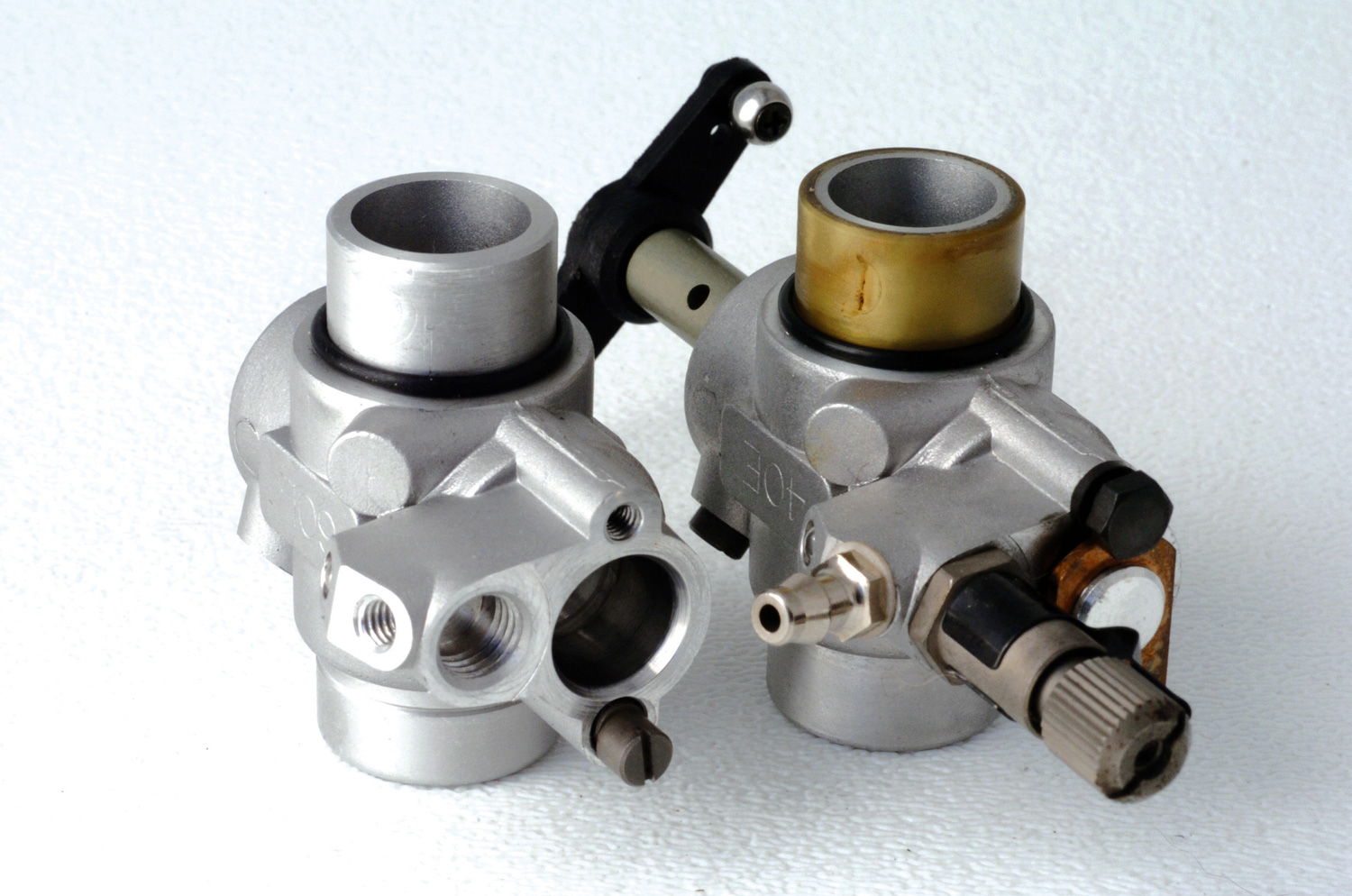 Close up photo of plastic sleeve used on 40E carb body to give the 15mm OD mount of the 60L carburetor