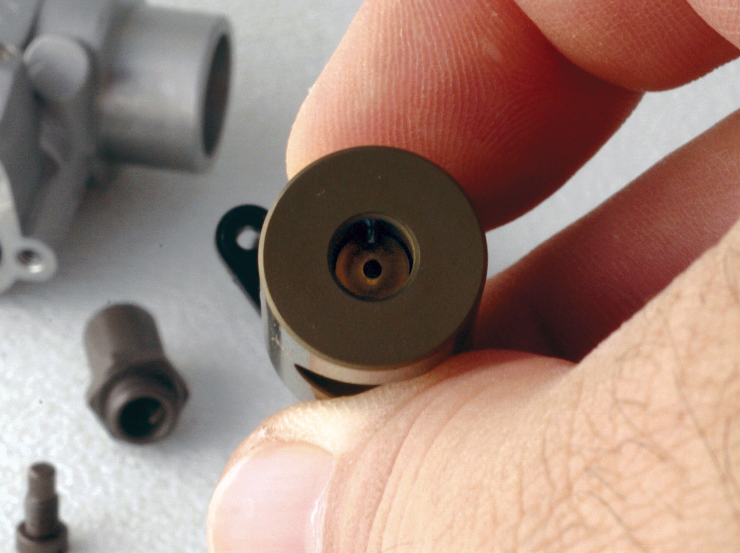 Close up of the end of the brass throttle barrel