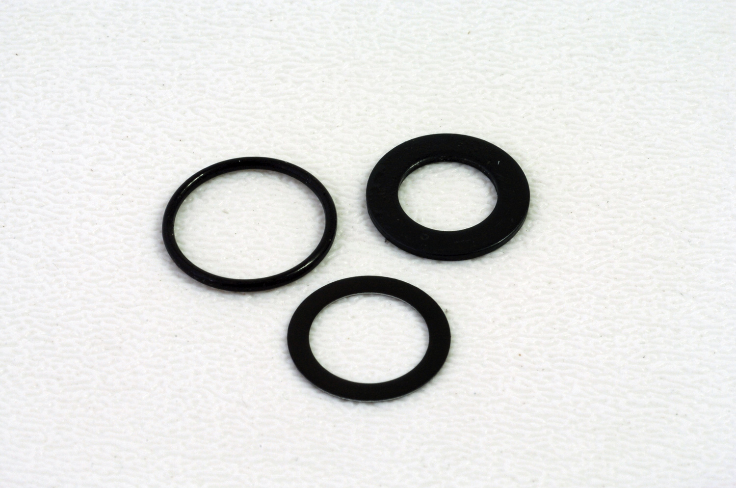 Close up photo of steel drive washer and rubber o-rings
