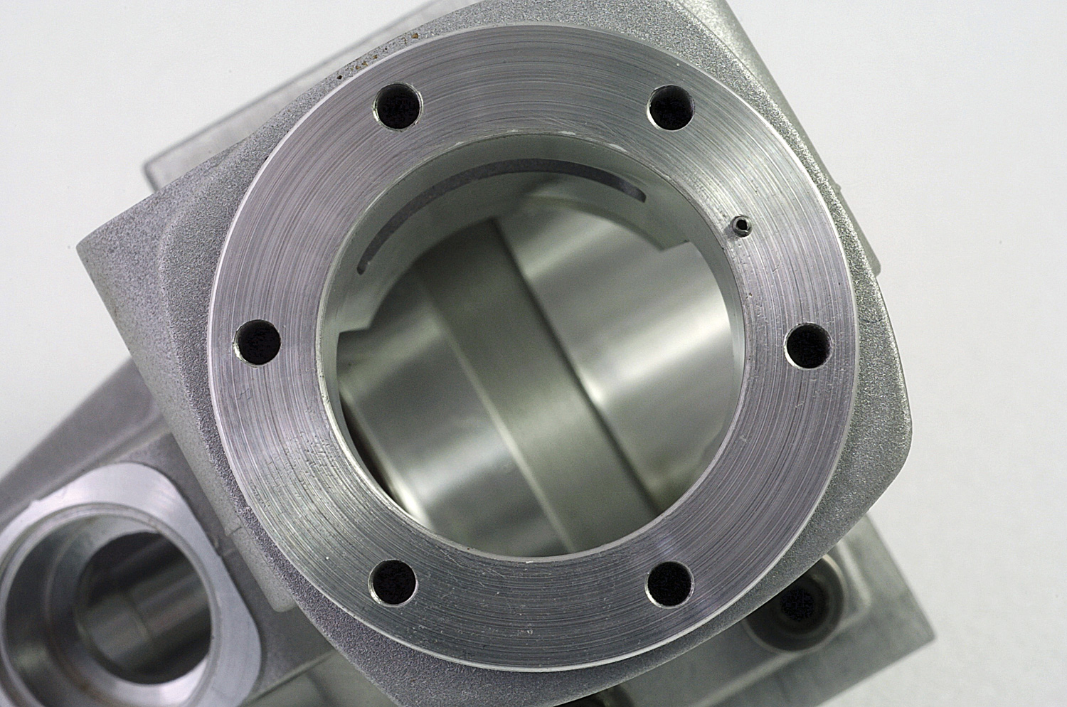 Close up of the top of the crankcase showing the roll-pin at about the 2 o’clock position relative to the photo