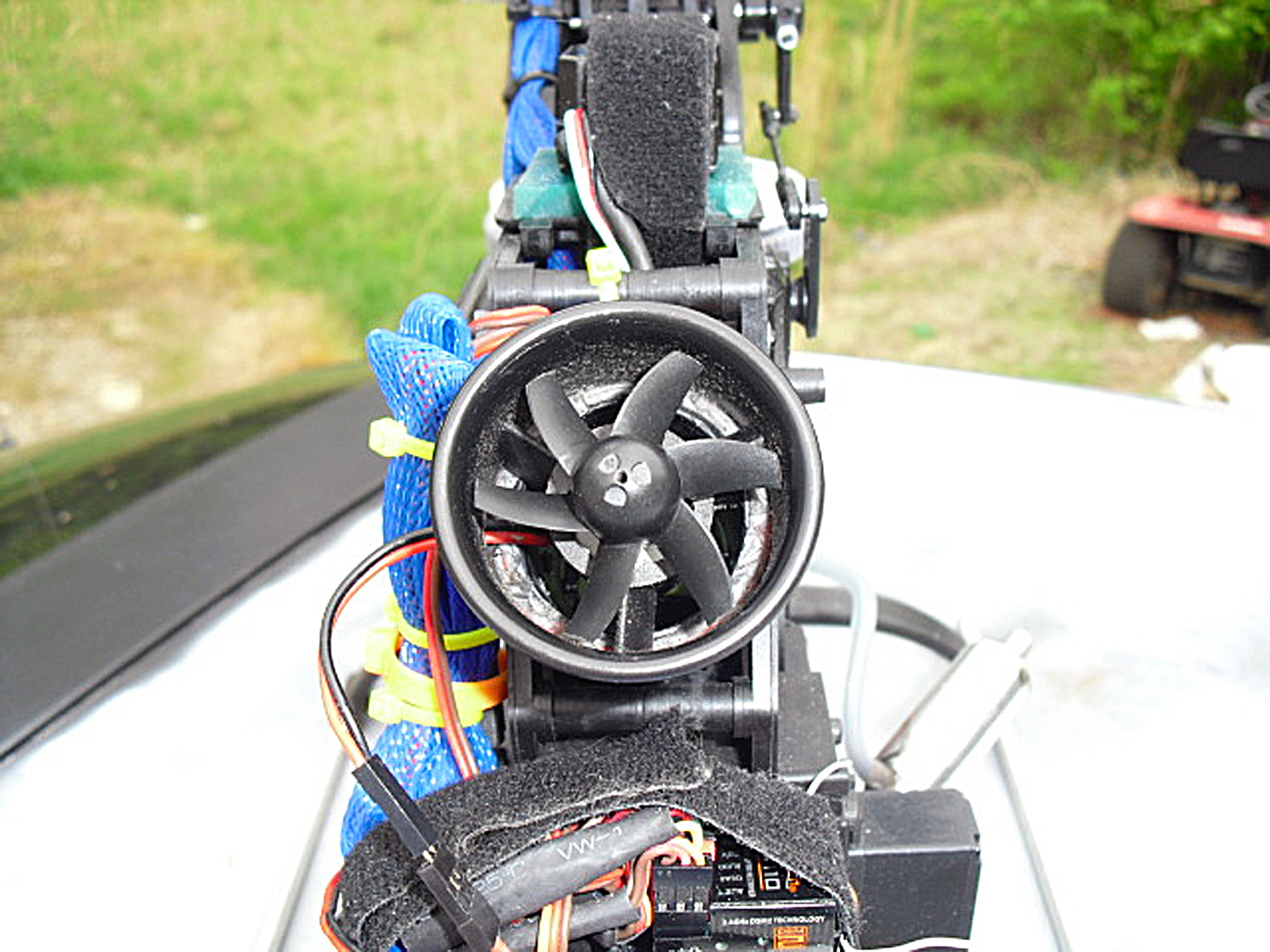 Close up photo showing the free-flight EDF unit directed to provide cooling air to a Pantera P6 with four-stroke engine conversion