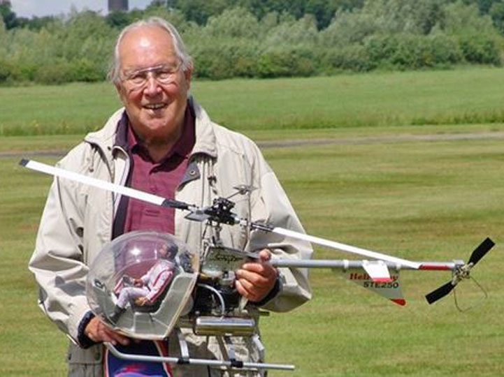 The father of model helicopters, Mr. Dieter Schlüter holding an example of his eponymous Heli-Baby