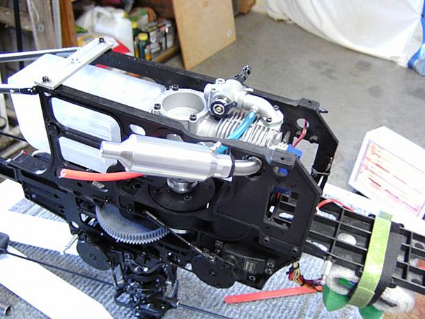 Photo of an ASP91, a clone of an OS MAX FS91, installed within a set of Pantera P6 helicopter mechanics by using an Audacity Models BBC kit plus a fan hub, part number AUD0037